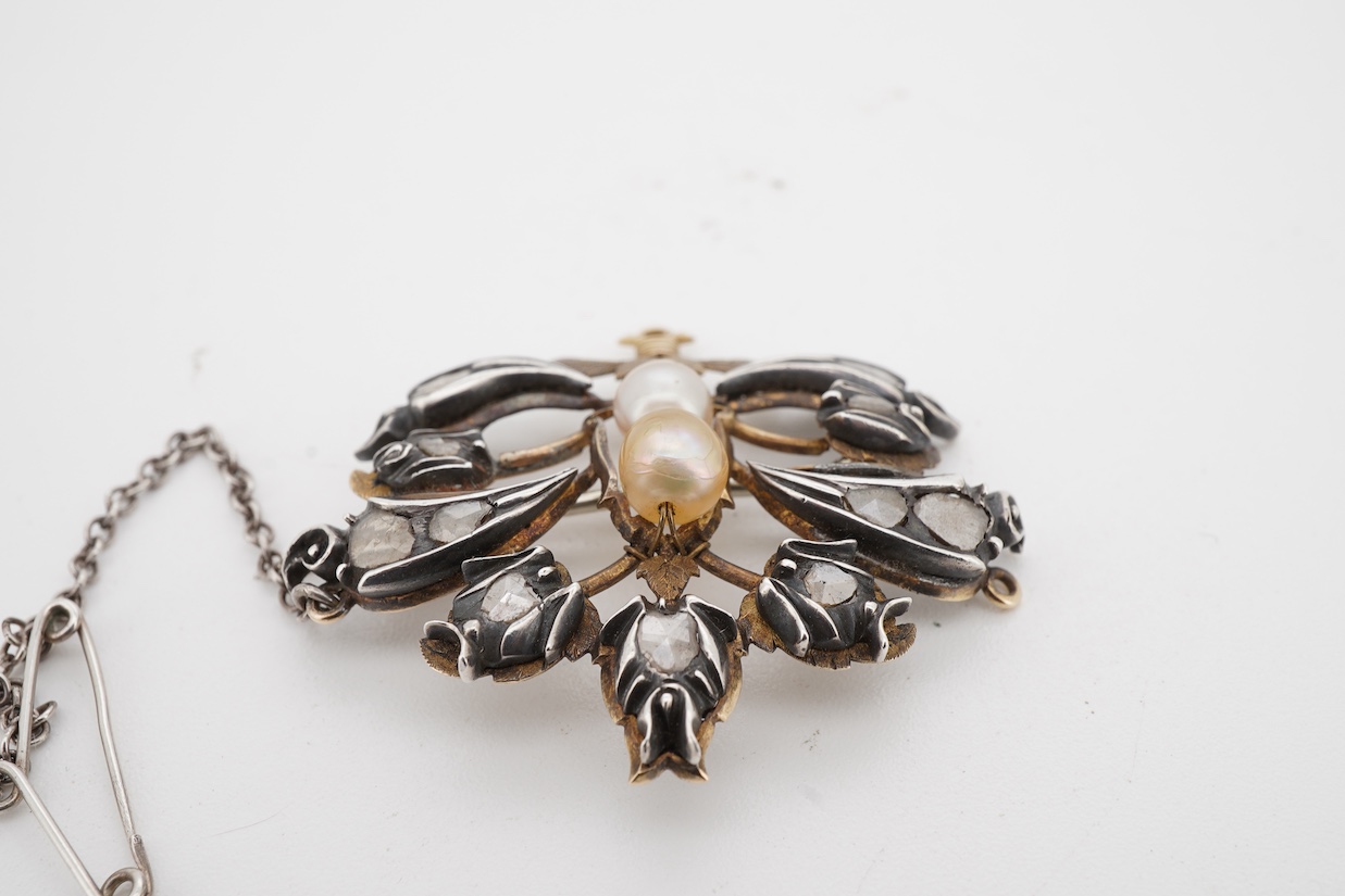 A yellow and white metal, pearl and rose cut diamond set bouquet brooch, width 36mm, pearls untested, with an associated Edward Tessier gilt tooled red leather fitted box.